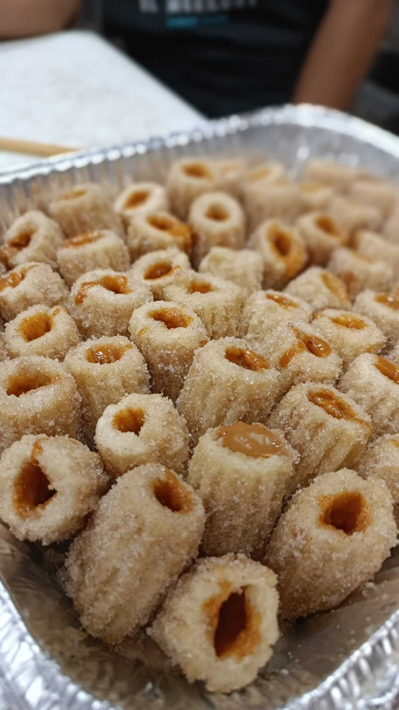 Tray of Filled Churros with cinnamon sugar and filled with your choice of dulce de leche, dark chocolate or coffee cream.