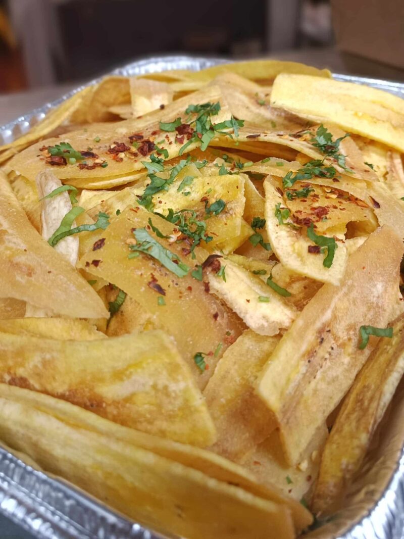 Thick cut plantains, fried until crispy and topped with sea salt, chili flakes and cilantro.