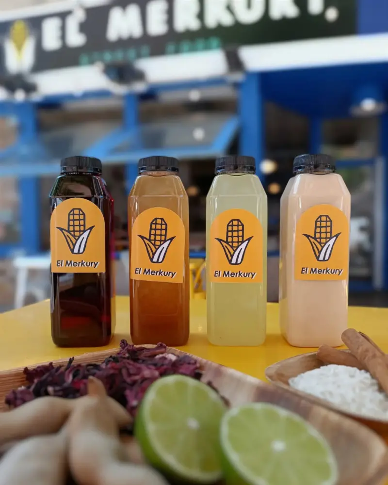 our 4 options of aguas frescas in a table: tamarind, hibiscus, lemon cucumber and almond milk horchata.