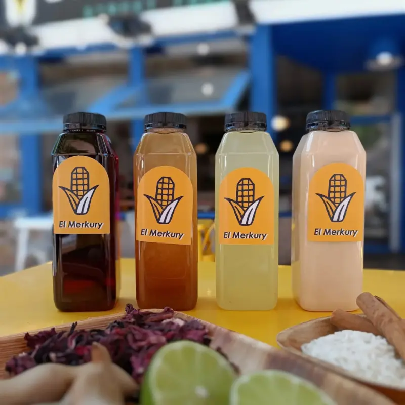 our 4 options of aguas frescas in a table: tamarind, hibiscus, lemon cucumber and almond milk horchata.